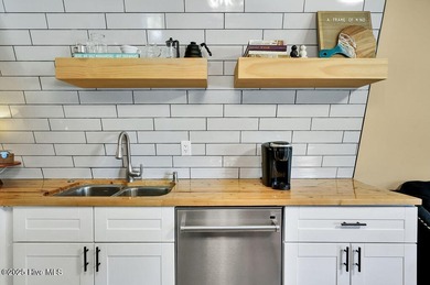 Welcome to 412 Womble Street which is located in the highly on Founders Club At St. James Plantation in North Carolina - for sale on GolfHomes.com, golf home, golf lot