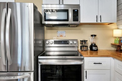 Welcome to 412 Womble Street which is located in the highly on Founders Club At St. James Plantation in North Carolina - for sale on GolfHomes.com, golf home, golf lot