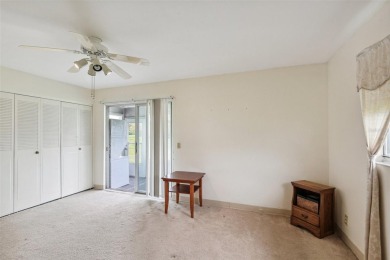 Under contract-accepting backup offers. Affordable end unit on Kings Point Executive Golf Course in Florida - for sale on GolfHomes.com, golf home, golf lot