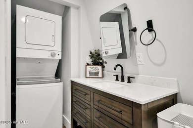 Welcome to 412 Womble Street which is located in the highly on Founders Club At St. James Plantation in North Carolina - for sale on GolfHomes.com, golf home, golf lot