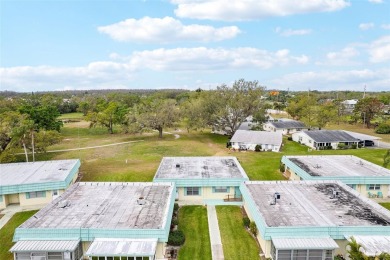 Under contract-accepting backup offers. Affordable end unit on Kings Point Executive Golf Course in Florida - for sale on GolfHomes.com, golf home, golf lot
