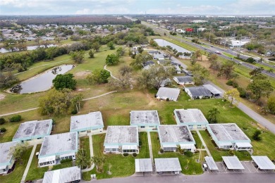 Under contract-accepting backup offers. Affordable end unit on Kings Point Executive Golf Course in Florida - for sale on GolfHomes.com, golf home, golf lot