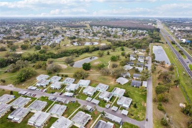 Under contract-accepting backup offers. Affordable end unit on Kings Point Executive Golf Course in Florida - for sale on GolfHomes.com, golf home, golf lot