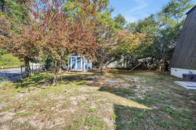Welcome to 412 Womble Street which is located in the highly on Founders Club At St. James Plantation in North Carolina - for sale on GolfHomes.com, golf home, golf lot