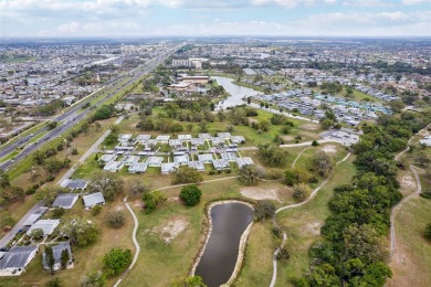 Under contract-accepting backup offers. Affordable end unit on Kings Point Executive Golf Course in Florida - for sale on GolfHomes.com, golf home, golf lot
