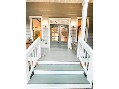 Quaint cottage style home in the sought-after Towne Lake Hills on Towne Lake Hills Golf Club in Georgia - for sale on GolfHomes.com, golf home, golf lot