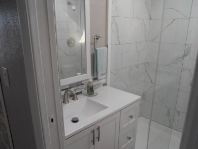 Charming two bedroom, one and a half bathroom home in the Bass on Polo Park East in Florida - for sale on GolfHomes.com, golf home, golf lot