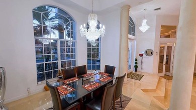 Panoramic golf and water views! Elegant home located on the 8th on TPC Eagle Trace in Florida - for sale on GolfHomes.com, golf home, golf lot