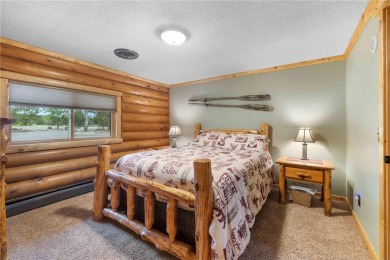 Take a look at this Pelican Lake log cabin, situated on the 19th on Breezy Point Golf Course Resort in Minnesota - for sale on GolfHomes.com, golf home, golf lot