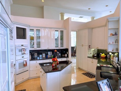 Panoramic golf and water views! Elegant home located on the 8th on TPC Eagle Trace in Florida - for sale on GolfHomes.com, golf home, golf lot