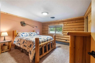 Take a look at this Pelican Lake log cabin, situated on the 19th on Breezy Point Golf Course Resort in Minnesota - for sale on GolfHomes.com, golf home, golf lot