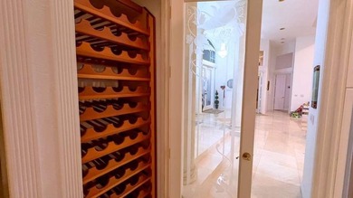 Panoramic golf and water views! Elegant home located on the 8th on TPC Eagle Trace in Florida - for sale on GolfHomes.com, golf home, golf lot