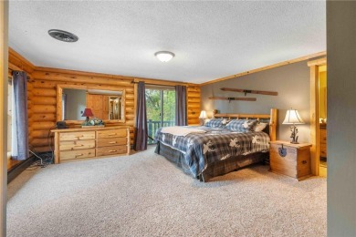 Take a look at this Pelican Lake log cabin, situated on the 19th on Breezy Point Golf Course Resort in Minnesota - for sale on GolfHomes.com, golf home, golf lot