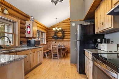 Take a look at this Pelican Lake log cabin, situated on the 19th on Breezy Point Golf Course Resort in Minnesota - for sale on GolfHomes.com, golf home, golf lot