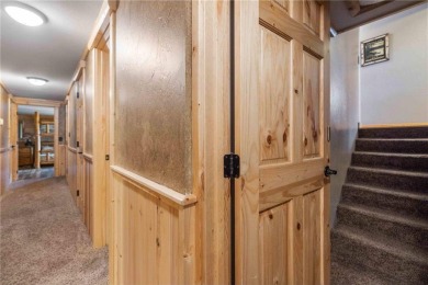 Take a look at this Pelican Lake log cabin, situated on the 19th on Breezy Point Golf Course Resort in Minnesota - for sale on GolfHomes.com, golf home, golf lot