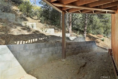 Breathtaking views from this beautiful secluded mountain home on Pine Mountain Club in California - for sale on GolfHomes.com, golf home, golf lot