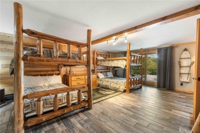 Take a look at this Pelican Lake log cabin, situated on the 19th on Breezy Point Golf Course Resort in Minnesota - for sale on GolfHomes.com, golf home, golf lot