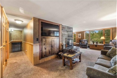 Take a look at this Pelican Lake log cabin, situated on the 19th on Breezy Point Golf Course Resort in Minnesota - for sale on GolfHomes.com, golf home, golf lot