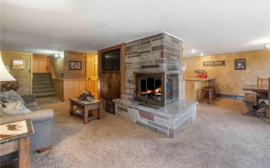 Take a look at this Pelican Lake log cabin, situated on the 19th on Breezy Point Golf Course Resort in Minnesota - for sale on GolfHomes.com, golf home, golf lot