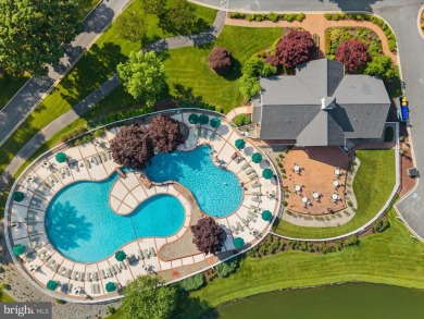 This spacious five-bedroom home invites you into the vibrant on Baywood Greens Golf Club in Delaware - for sale on GolfHomes.com, golf home, golf lot