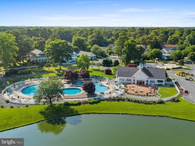 This spacious five-bedroom home invites you into the vibrant on Baywood Greens Golf Club in Delaware - for sale on GolfHomes.com, golf home, golf lot
