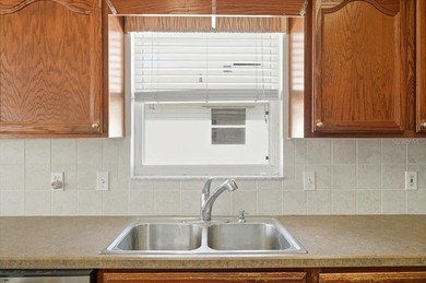 Enjoy easy Florida living in this beautifully maintained and on Highland Fairways Golf Club in Florida - for sale on GolfHomes.com, golf home, golf lot