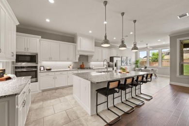 Welcome to this immaculate former model home, nestled on a on The Golf Club at Resort Eagle Mountain Lake in Texas - for sale on GolfHomes.com, golf home, golf lot