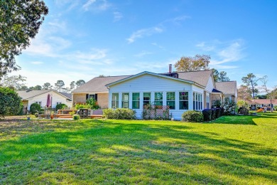 What an incredible find! Nestled on a spacious lot along Hole 12 on Santee-Cooper Country Club in South Carolina - for sale on GolfHomes.com, golf home, golf lot