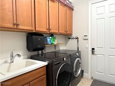 THIS LOVELY HOME IS A MUST SEE TO BELIEVE! This Meticulously on Gateway Golf and Country Club in Florida - for sale on GolfHomes.com, golf home, golf lot