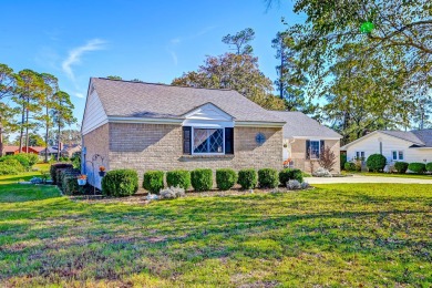 What an incredible find! Nestled on a spacious lot along Hole 12 on Santee-Cooper Country Club in South Carolina - for sale on GolfHomes.com, golf home, golf lot