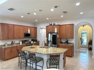 THIS LOVELY HOME IS A MUST SEE TO BELIEVE! This Meticulously on Gateway Golf and Country Club in Florida - for sale on GolfHomes.com, golf home, golf lot