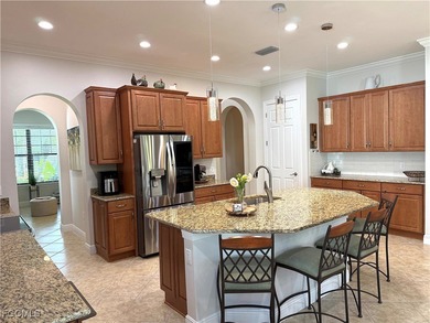 THIS LOVELY HOME IS A MUST SEE TO BELIEVE! This Meticulously on Gateway Golf and Country Club in Florida - for sale on GolfHomes.com, golf home, golf lot