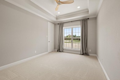 Welcome to this immaculate former model home, nestled on a on The Golf Club at Resort Eagle Mountain Lake in Texas - for sale on GolfHomes.com, golf home, golf lot