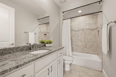 Welcome to this immaculate former model home, nestled on a on The Golf Club at Resort Eagle Mountain Lake in Texas - for sale on GolfHomes.com, golf home, golf lot