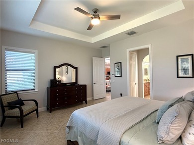 THIS LOVELY HOME IS A MUST SEE TO BELIEVE! This Meticulously on Gateway Golf and Country Club in Florida - for sale on GolfHomes.com, golf home, golf lot