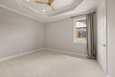 Welcome to this immaculate former model home, nestled on a on The Golf Club at Resort Eagle Mountain Lake in Texas - for sale on GolfHomes.com, golf home, golf lot