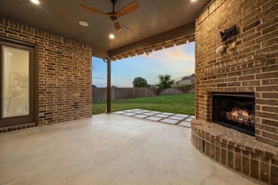Welcome to this immaculate former model home, nestled on a on The Golf Club at Resort Eagle Mountain Lake in Texas - for sale on GolfHomes.com, golf home, golf lot