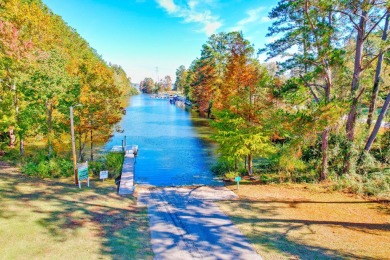 What an incredible find! Nestled on a spacious lot along Hole 12 on Santee-Cooper Country Club in South Carolina - for sale on GolfHomes.com, golf home, golf lot