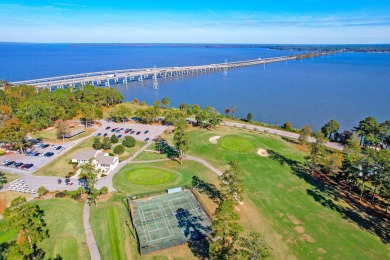 What an incredible find! Nestled on a spacious lot along Hole 12 on Santee-Cooper Country Club in South Carolina - for sale on GolfHomes.com, golf home, golf lot