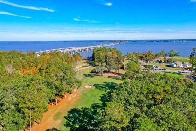 What an incredible find! Nestled on a spacious lot along Hole 12 on Santee-Cooper Country Club in South Carolina - for sale on GolfHomes.com, golf home, golf lot