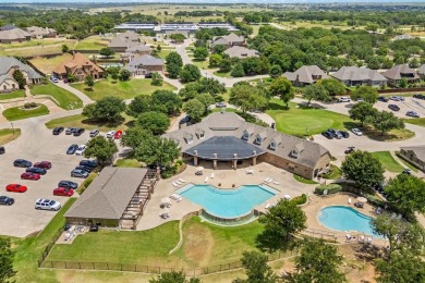Welcome to this immaculate former model home, nestled on a on The Golf Club at Resort Eagle Mountain Lake in Texas - for sale on GolfHomes.com, golf home, golf lot