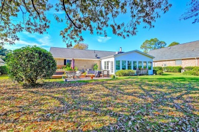 What an incredible find! Nestled on a spacious lot along Hole 12 on Santee-Cooper Country Club in South Carolina - for sale on GolfHomes.com, golf home, golf lot