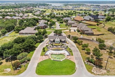 Welcome to this immaculate former model home, nestled on a on The Golf Club at Resort Eagle Mountain Lake in Texas - for sale on GolfHomes.com, golf home, golf lot