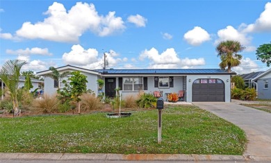 Discover the perfect blend of mid-century charm and modern on Venice East Golf Club in Florida - for sale on GolfHomes.com, golf home, golf lot