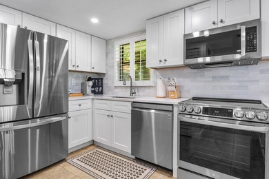 Enjoy serene golf course views from this spacious & beautifully on Quail Ridge Golf Course and Country Club in Florida - for sale on GolfHomes.com, golf home, golf lot