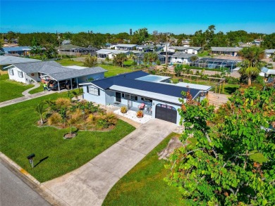 Discover the perfect blend of mid-century charm and modern on Venice East Golf Club in Florida - for sale on GolfHomes.com, golf home, golf lot