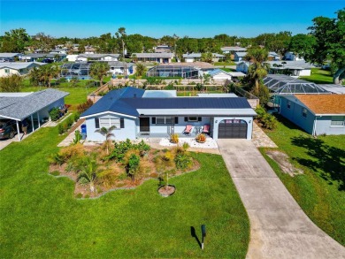 Discover the perfect blend of mid-century charm and modern on Venice East Golf Club in Florida - for sale on GolfHomes.com, golf home, golf lot