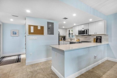 Enjoy serene golf course views from this spacious & beautifully on Quail Ridge Golf Course and Country Club in Florida - for sale on GolfHomes.com, golf home, golf lot