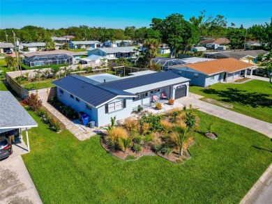 Discover the perfect blend of mid-century charm and modern on Venice East Golf Club in Florida - for sale on GolfHomes.com, golf home, golf lot