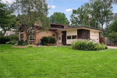 This classic mid-century modern home makes a dramatic statement on Brookview Golf Course - Brookview in Minnesota - for sale on GolfHomes.com, golf home, golf lot